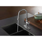 Gourmetier LS2723NYL New York Single-Handle Pull-Down Kitchen Faucet, Brushed Brass in a modern kitchen setting.