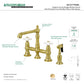 Kingston KS7277PXBS English Country Bridge Kitchen Faucet with Brass Sprayer, Brushed Brass, featuring porcelain cross handles.
