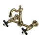 Kingston KS2443PKX Duchess Two-Handle Wall Mount Bridge Kitchen Faucet, Antique Brass with black handles.