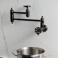 Kingston Brass KS3103RX Belknap Wall Mount Pot Filler Faucet, Antique Brass wall-mounted faucet with pot.