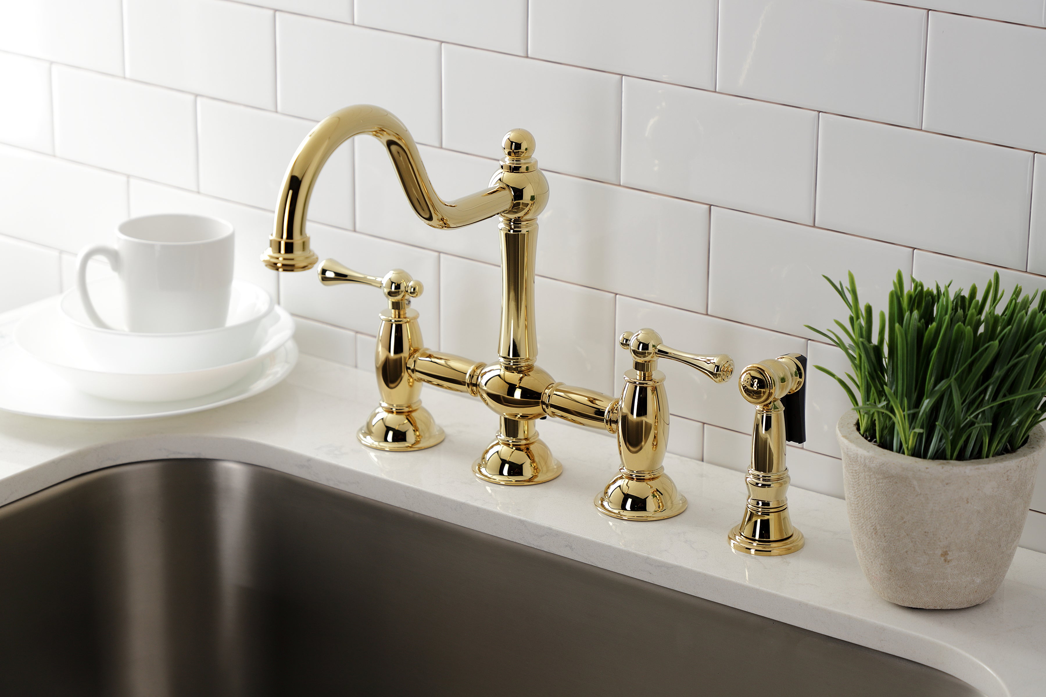 Kingston KS3798BLBS Restoration Bridge Kitchen Faucet with Brass Sprayer, Brushed Nickel in a kitchen setting.