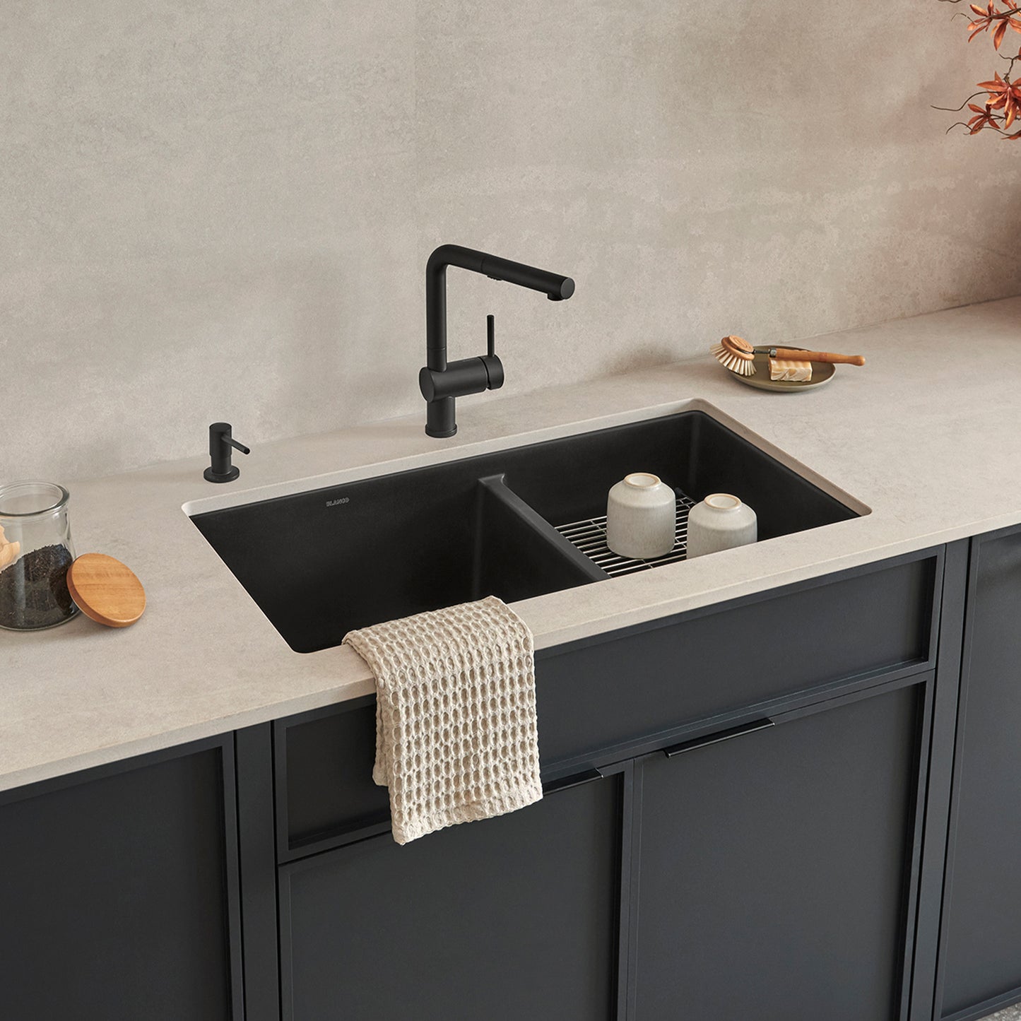 BLANCO Precis SILGRANIT 33" 60/40 Double Bowl Undermount Kitchen Sink with black faucet and neutral countertop.