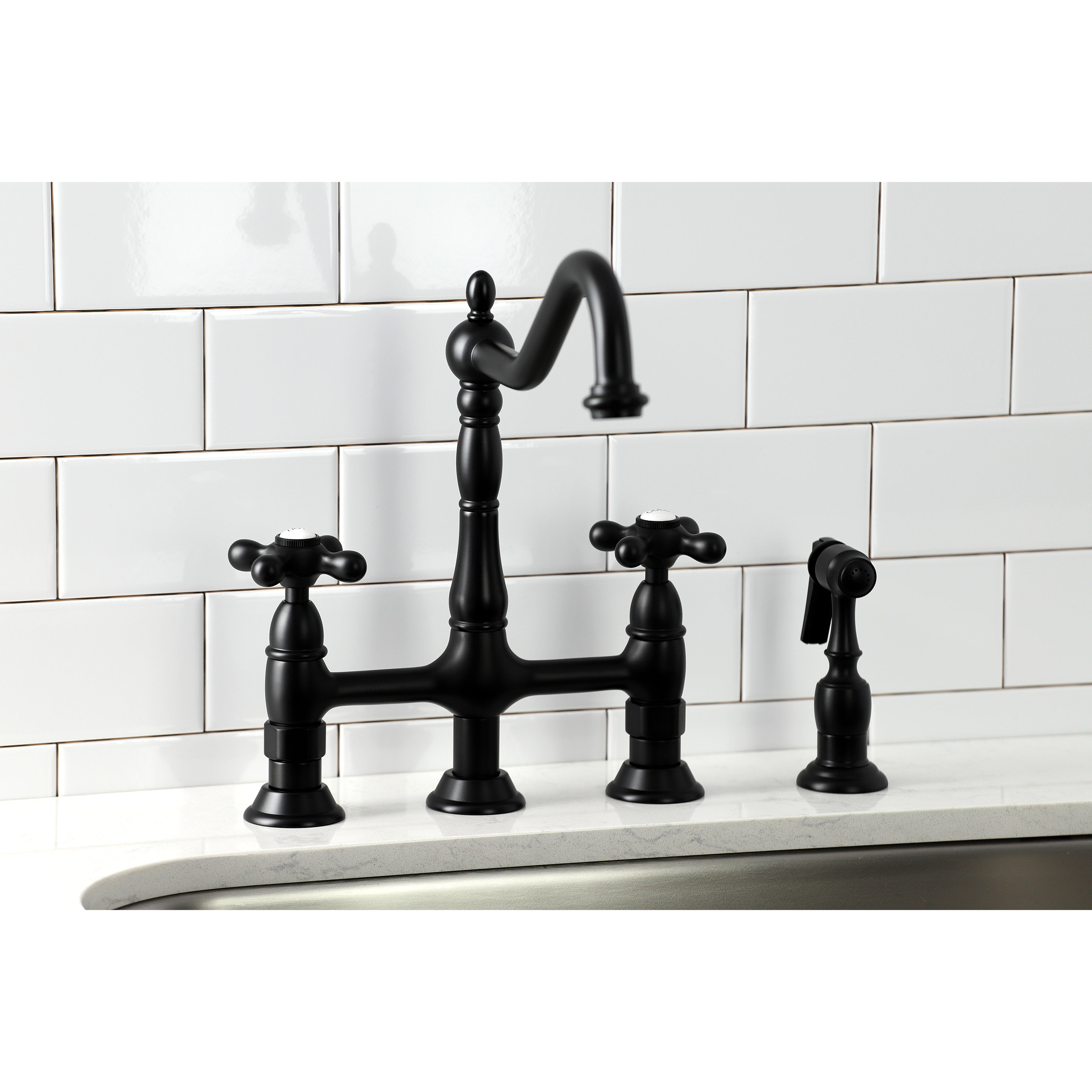 Kingston KS1273AXBS Heritage Bridge Kitchen Faucet with Brass Sprayer, Antique Brass in a traditional kitchen setting