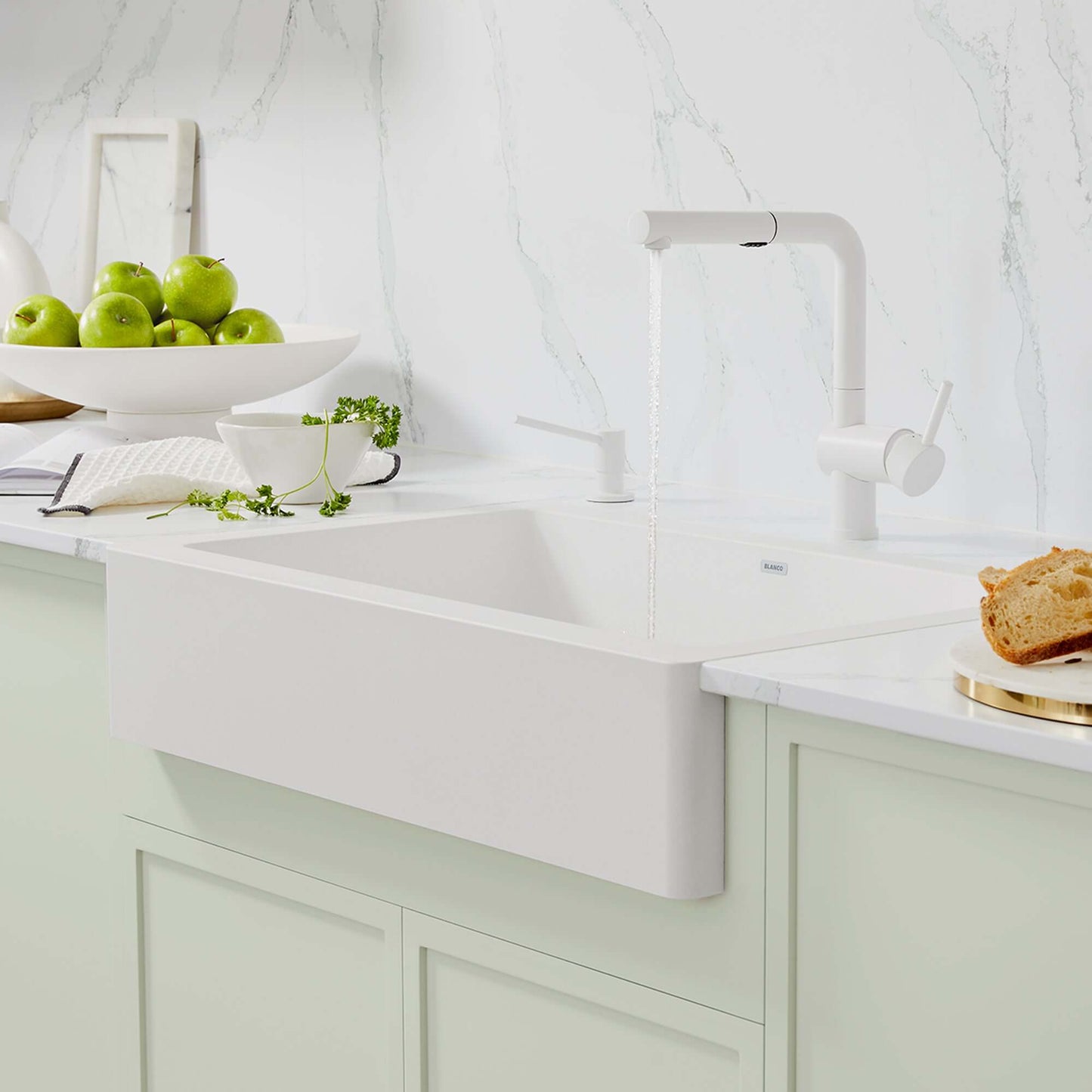 BLANCO Linus Low Arc Pull-Out Dual-Spray Kitchen Faucet - White in a modern kitchen setting with white sink.