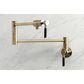 Kingston Brass KS4103DKL Kaiser Wall Mount Pot Filler Faucet, Antique Brass on marble background.