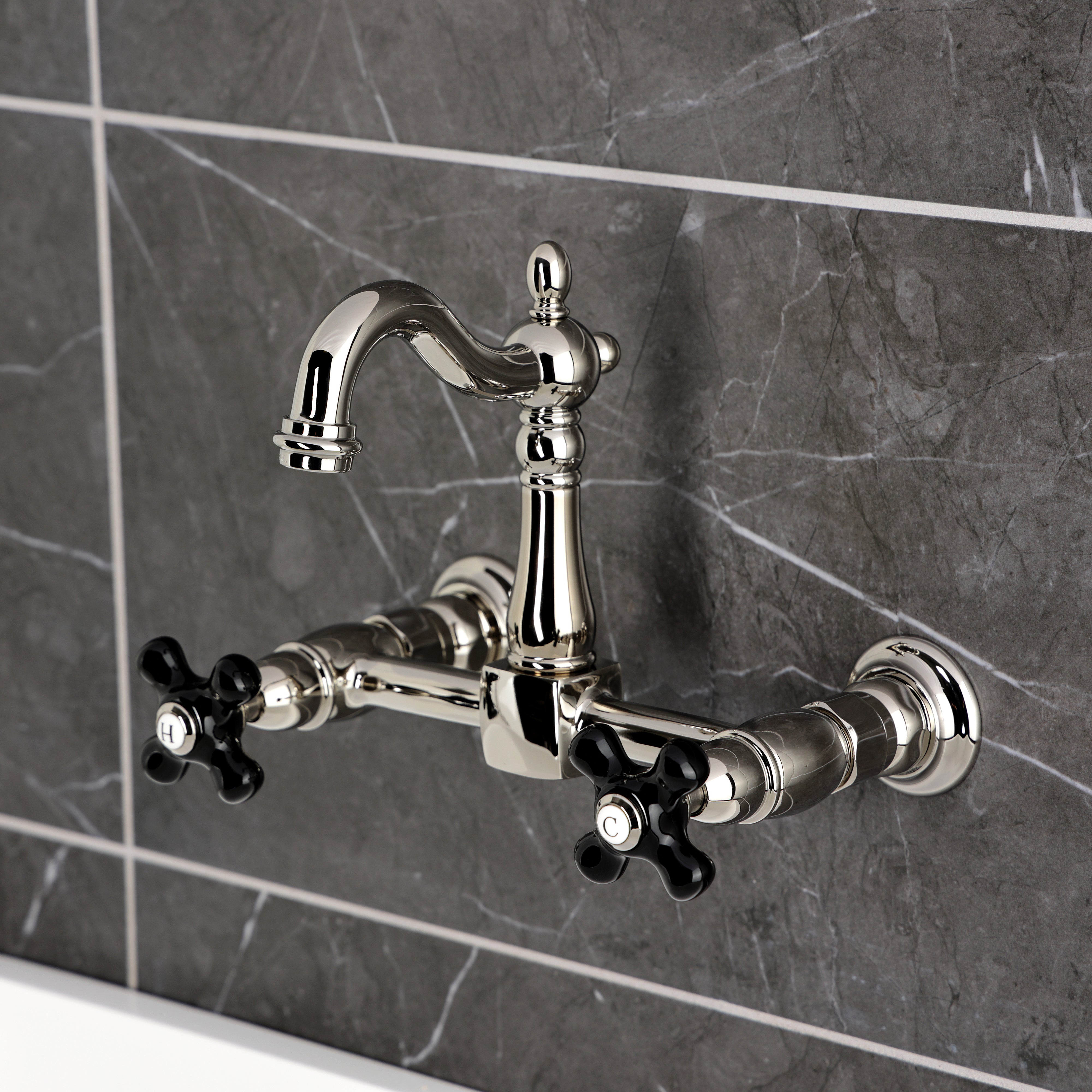 Kingston KS2443PKX Duchess Two-Handle Wall Mount Bridge Kitchen Faucet, Antique Brass with black handles