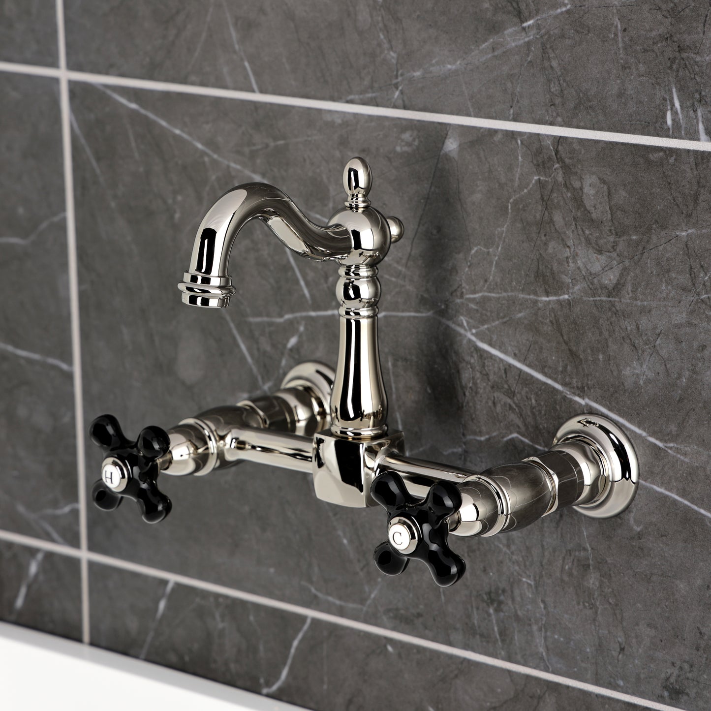 Kingston KS2443PKX Duchess Two-Handle Wall Mount Bridge Kitchen Faucet, Antique Brass with black handles