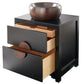 Alternate three-quarter view of the Thompson Permanente vanity and aged copper vessel