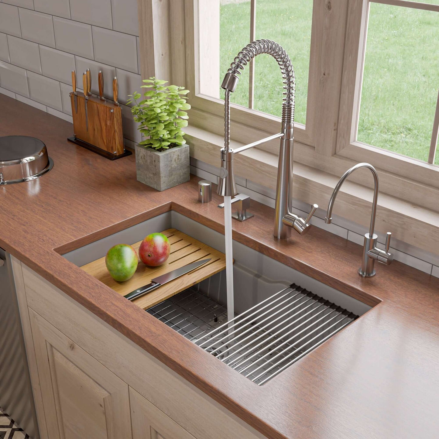 Alfi 32" Dual Mount Fireclay Workstation Kitchen Sink - ABFS3219SUD with bamboo cutting board and apples in kitchen.