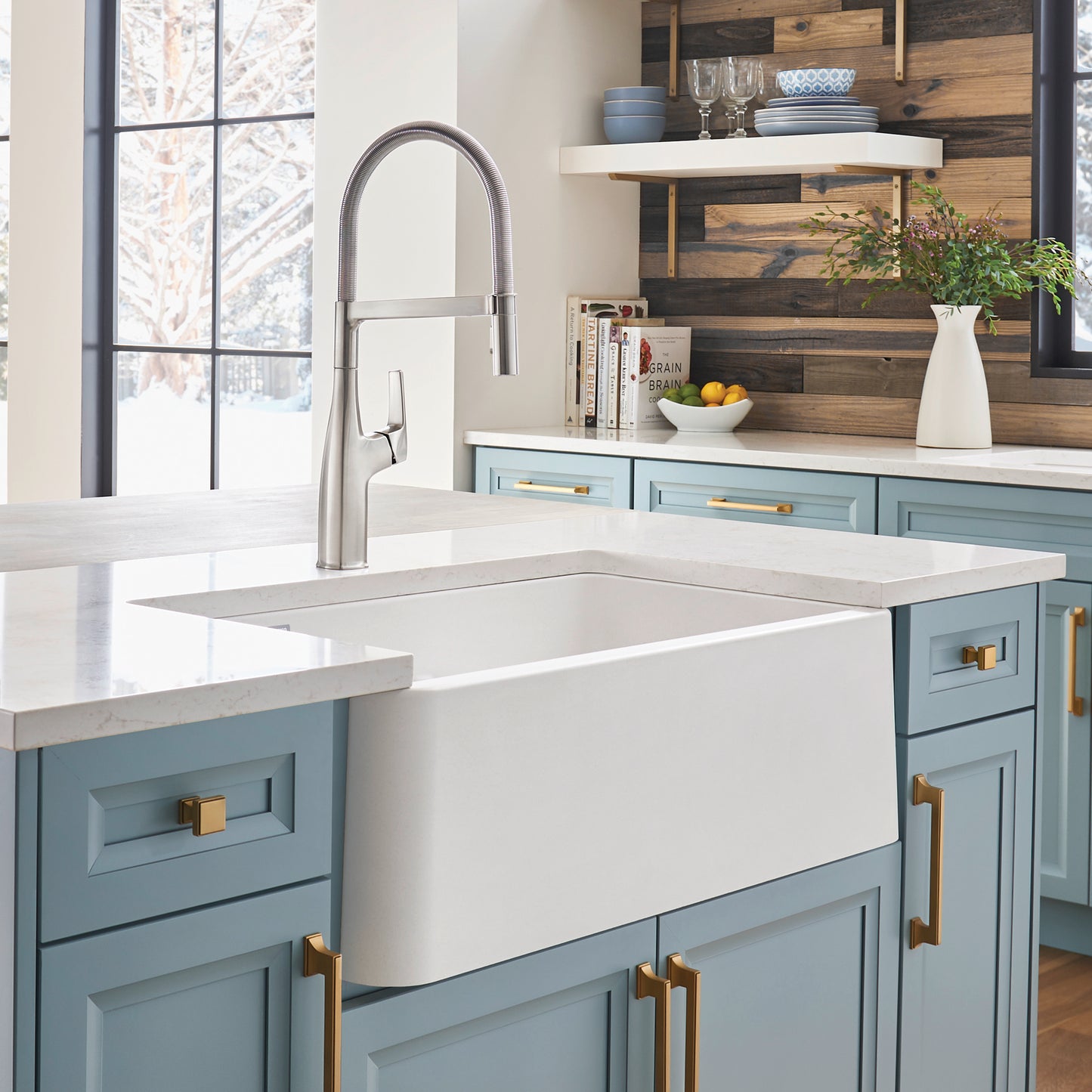 BLANCO Ikon SILGRANIT 33" Double Bowl Apron-Front Farmhouse Sink with Low Divide in a stylish kitchen setting.