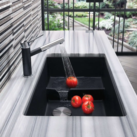 BLANCO Precis Cascade SILGRANIT 29" Single Bowl Undermount Kitchen Sink with Colander rinsing tomatoes.