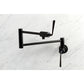 Kingston Brass KS4108ZL Silver Sage Wall Mount Pot Filler Faucet, Brushed Nickel on marble background.