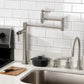 Kingston Brass KS870DLAC Concord Deck Mount Pot Filler Faucet, Antique Copper mounted in a modern kitchen setting.