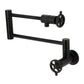 Kingston Brass KS4103CG Fuller Wall Mount Pot Filler Faucet, Antique Brass with matte black finish and foldable swing arms.