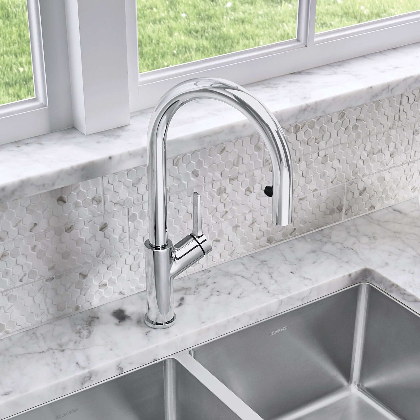 BLANCO Urbena Pull-Down Dual-Spray Kitchen Faucet in a modern kitchen with marble countertop.