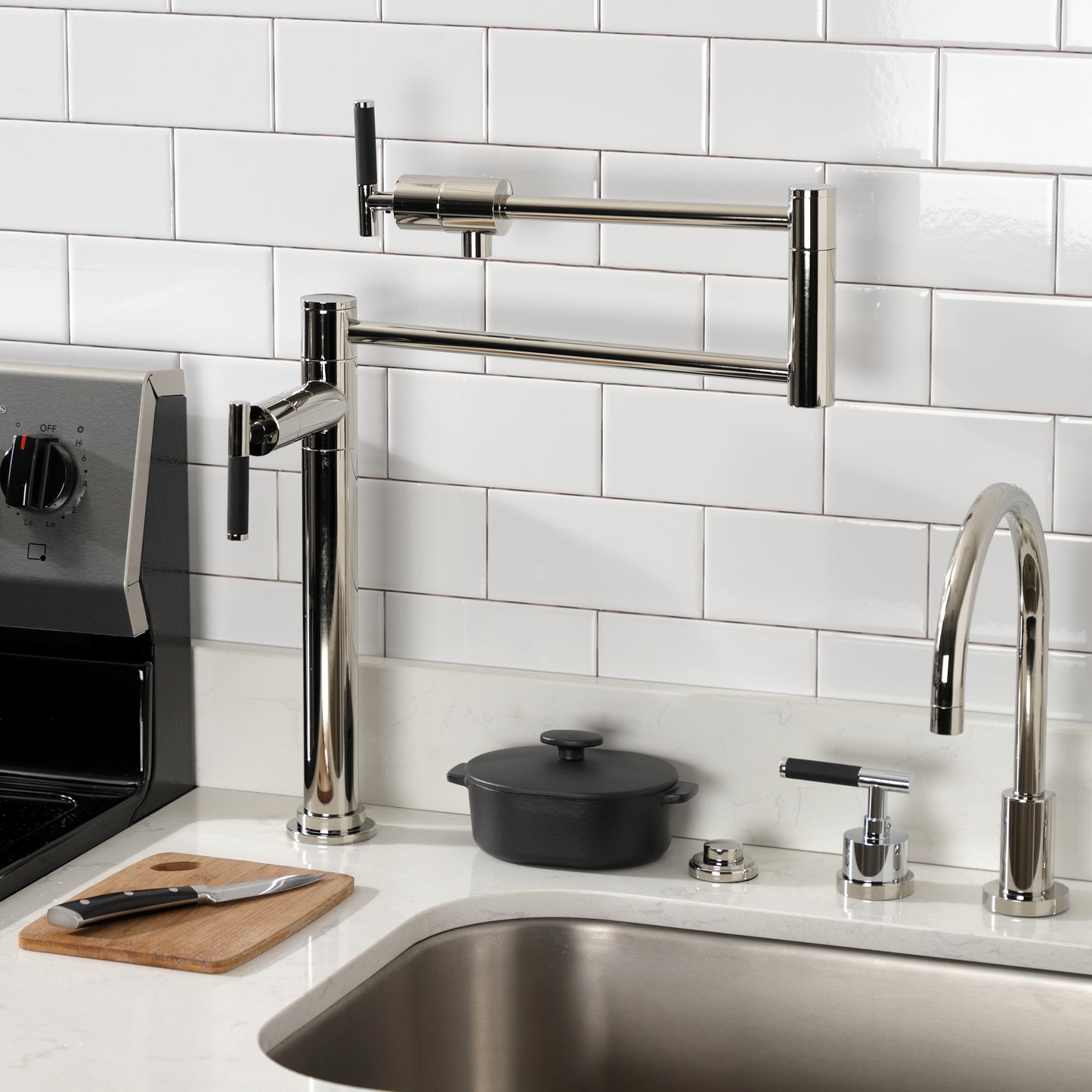 Kingston Brass KS4703CKL Kaiser Deck Mount Pot Filler Faucet, Antique Brass in a modern kitchen setting.