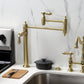 Kingston Brass KS3703BAL Heirloom Deck Mount Pot Filler Faucet, Antique Brass in a kitchen setting.