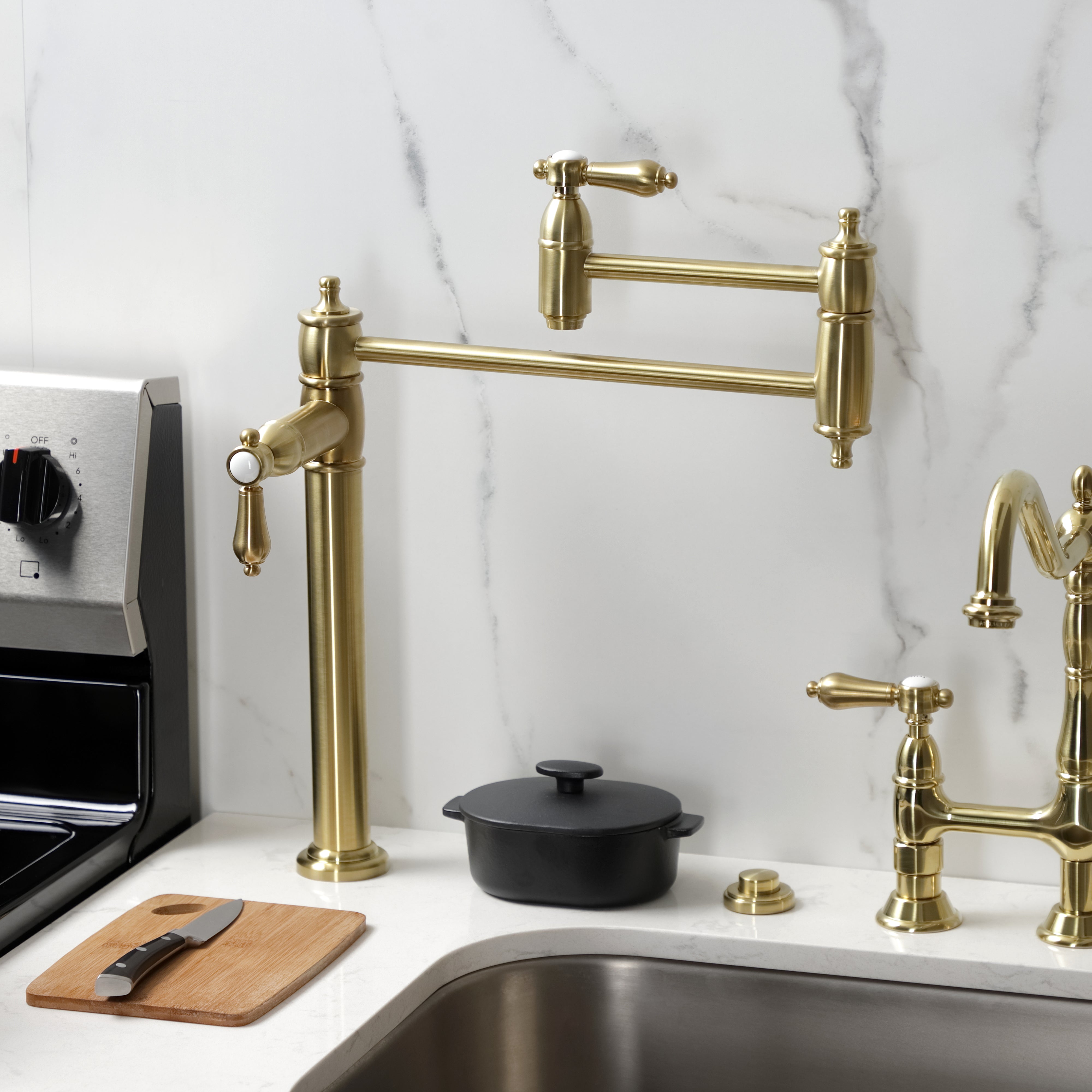 Kingston Brass KS3703BAL Heirloom Deck Mount Pot Filler Faucet, Antique Brass in a kitchen setting.