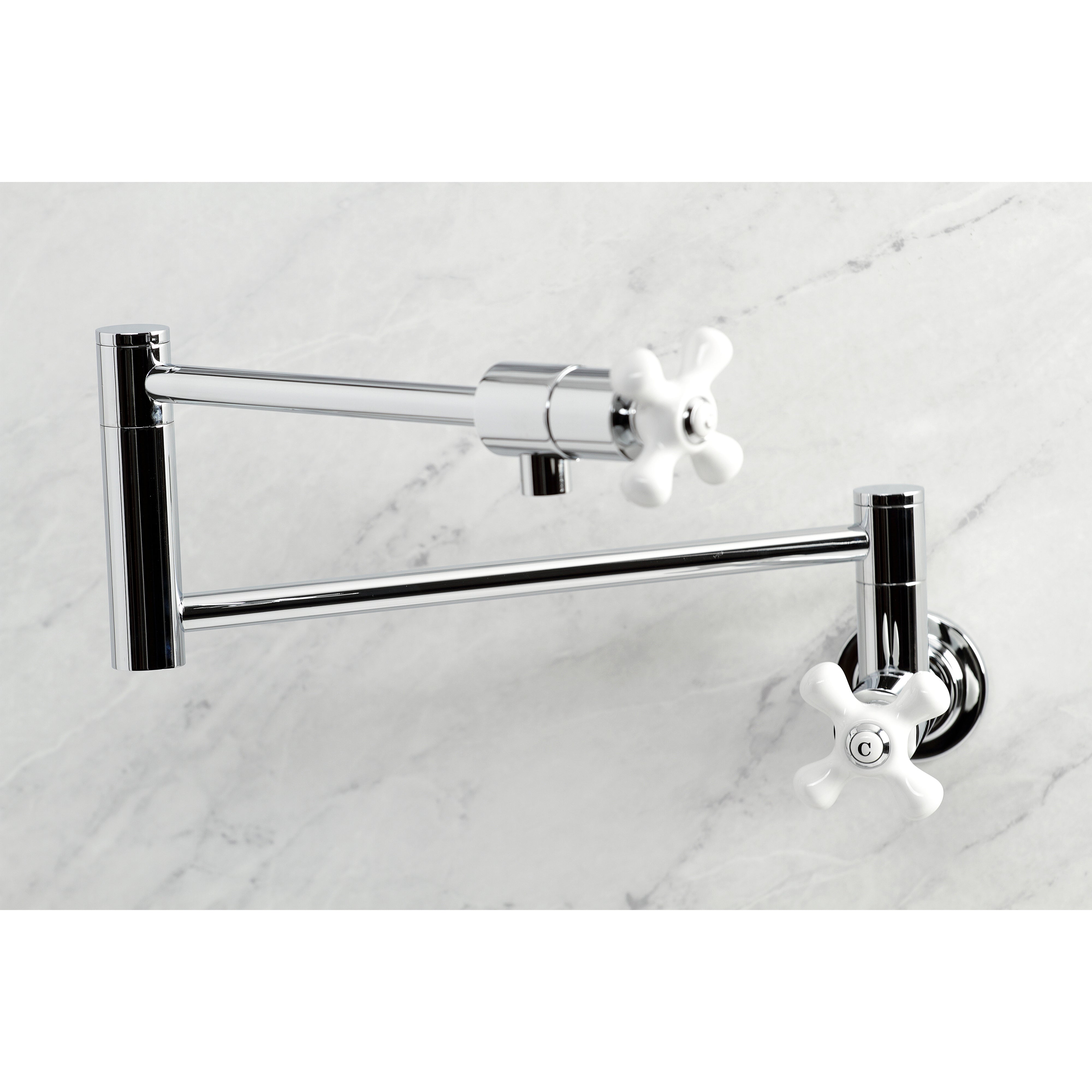 Kingston Brass KS4107PX Metropolitan Wall Mount Pot Filler Faucet, Brushed Brass with white knob detail.