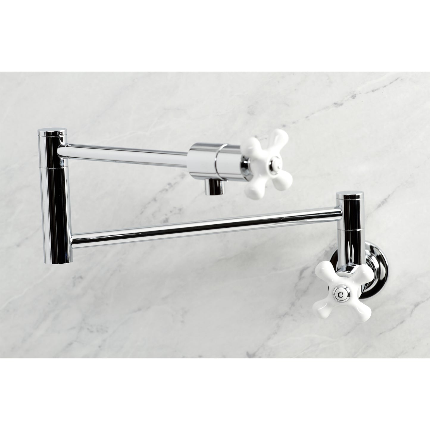 Kingston Brass KS4107PX Metropolitan Wall Mount Pot Filler Faucet, Brushed Brass with white knob detail.