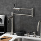 Kingston Brass KS4703DKL Kaiser Deck Mount Pot Filler Faucet, Antique Brass in a modern kitchen setting.