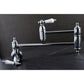 Kingston Brass KS3103PL Restoration Wall Mount Pot Filler Faucet, Antique Brass in a chrome finish with white handles