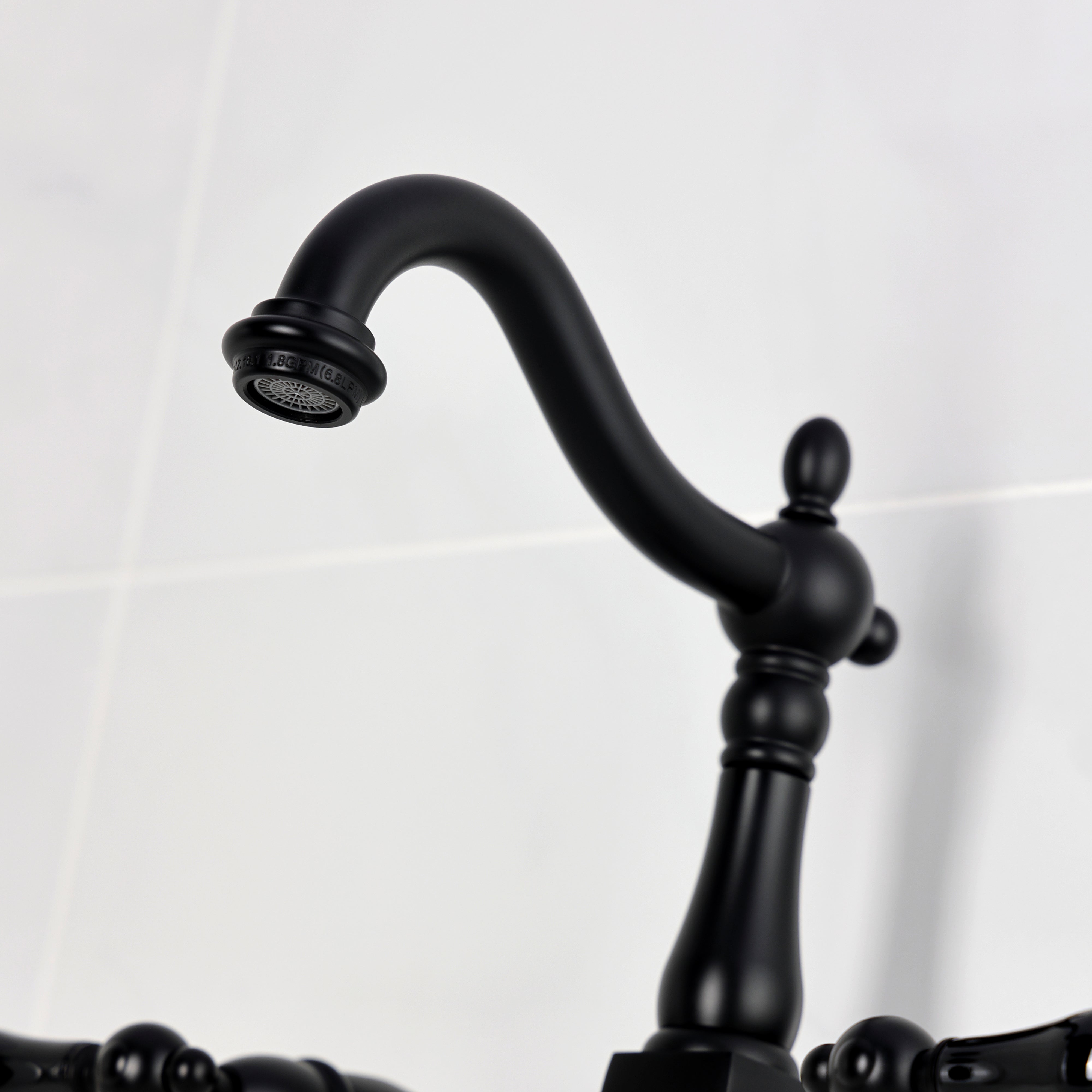 Kingston KS1263PKL Duchess Two-Handle Wall Mount Bridge Kitchen Faucet, Antique Brass spout detail