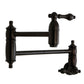 Kingston Brass KS3103AL Restoration Wall Mount Pot Filler Faucet, Antique Brass with oil rubbed bronze finish.