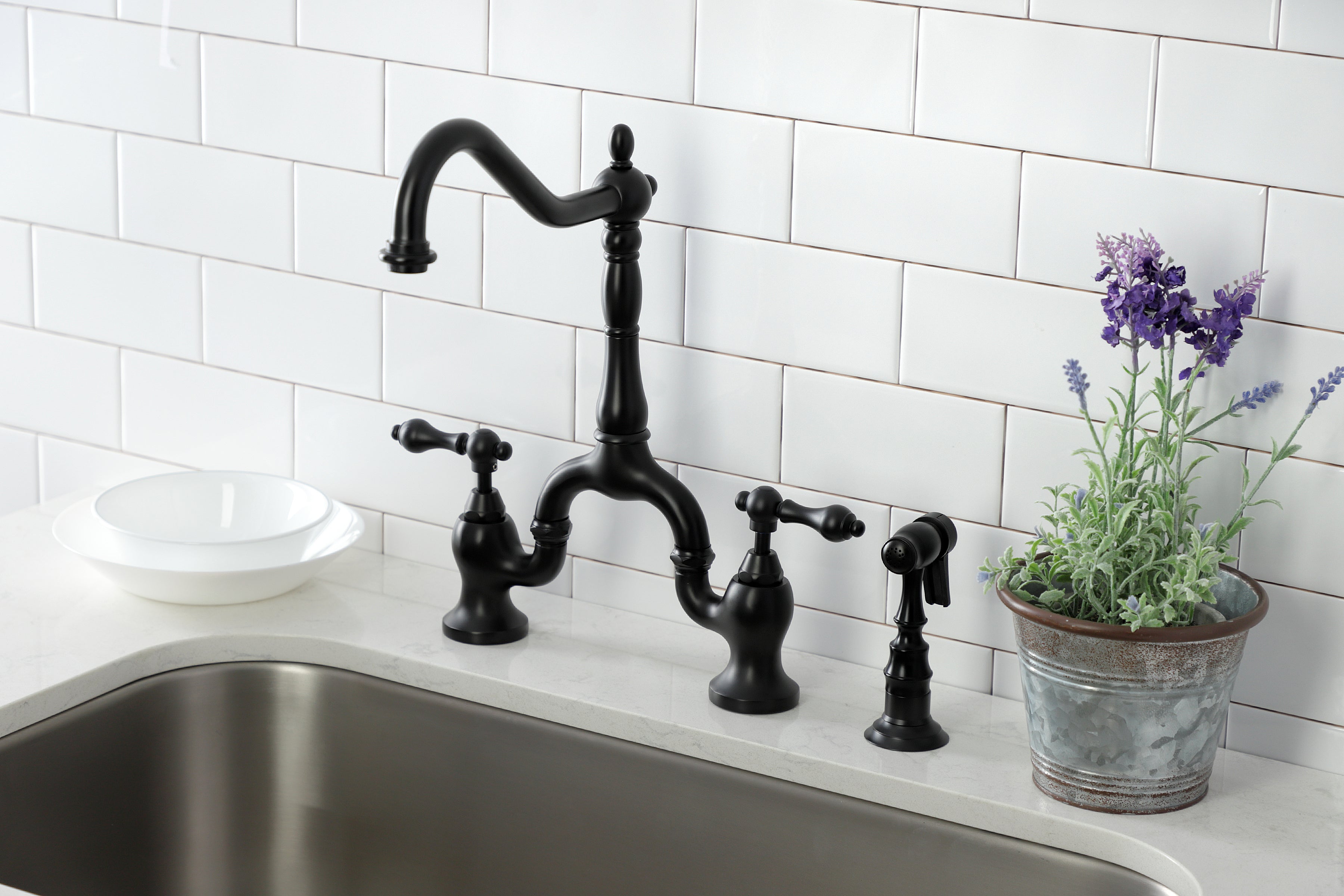 Kingston KS7750ALBS English Country Bridge Kitchen Faucet with Brass Sprayer, Matte Black in a kitchen setting