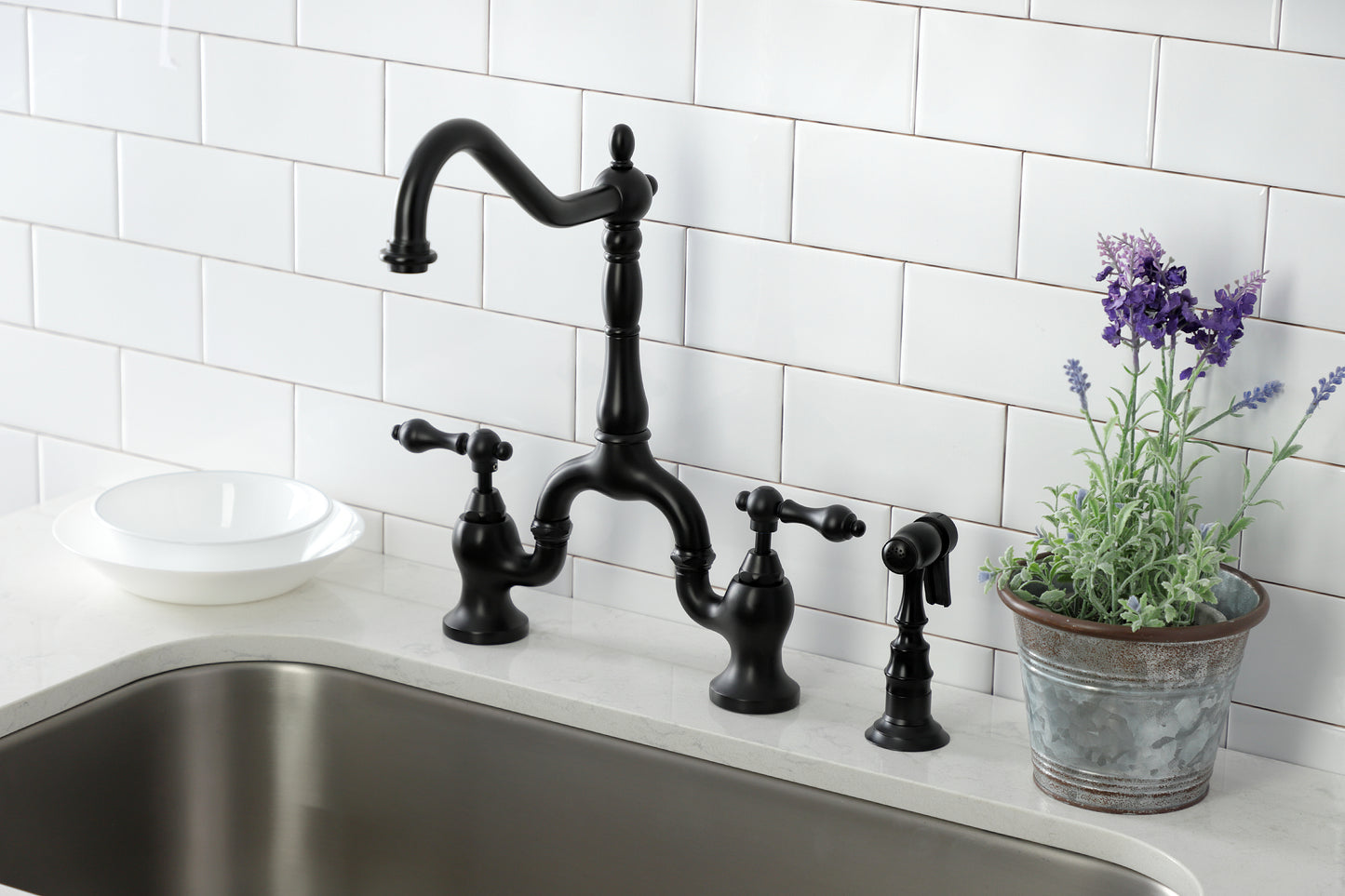 Kingston KS7750ALBS English Country Bridge Kitchen Faucet with Brass Sprayer, Matte Black in a kitchen setting