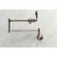 Kingston Brass KS4103DFL NuWave Wall Mount Pot Filler Faucet, Antique Brass on marble surface.