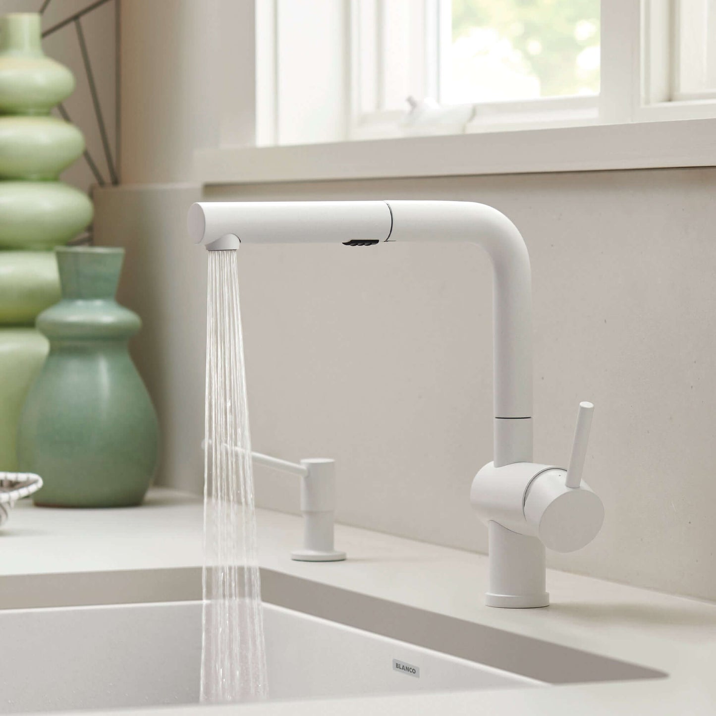 BLANCO Linus Low Arc Pull-Out Dual-Spray Kitchen Faucet - White with water stream