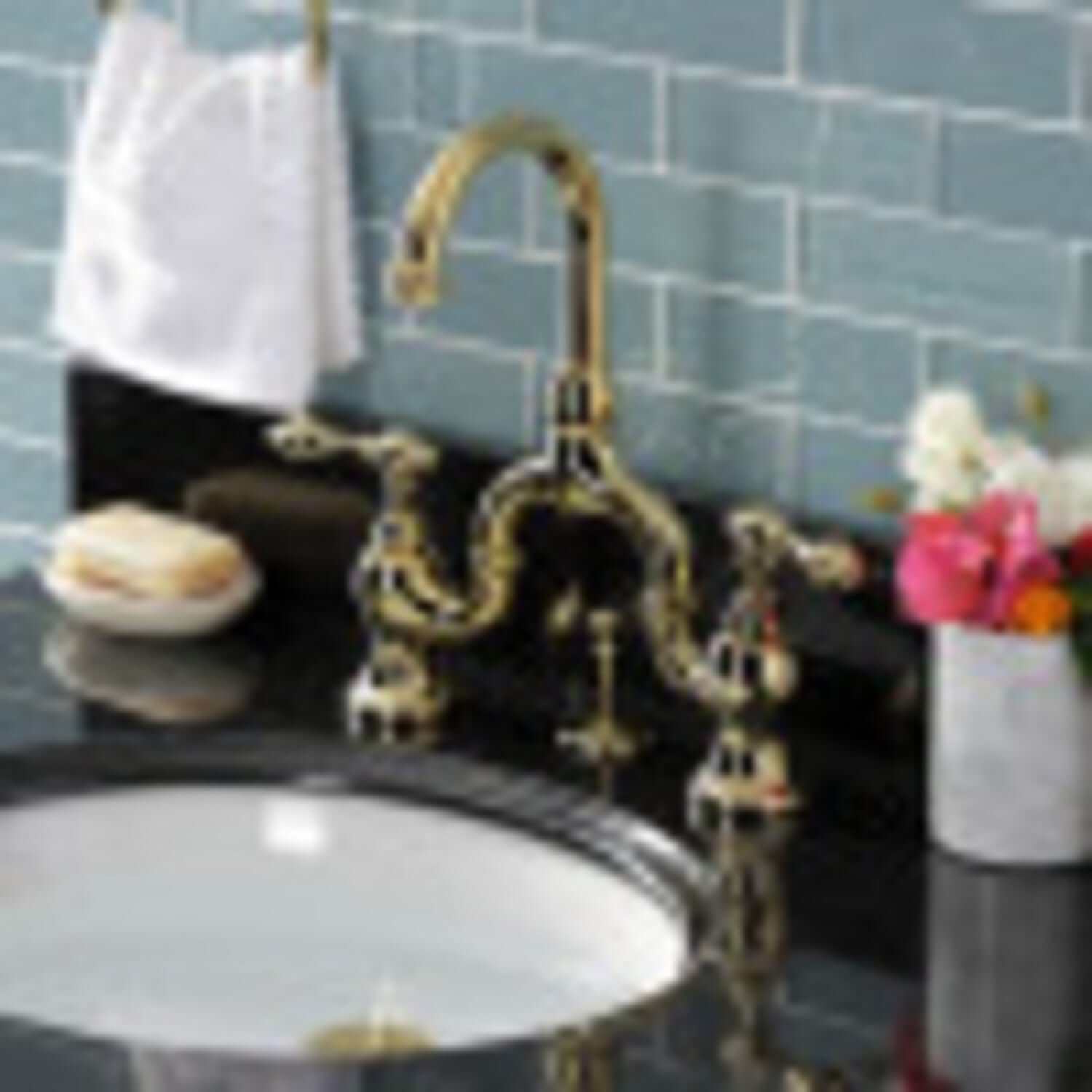 KINGSTON Brass English Country Bridge Bathroom Faucet with Brass Pop-Up - Polished Brass