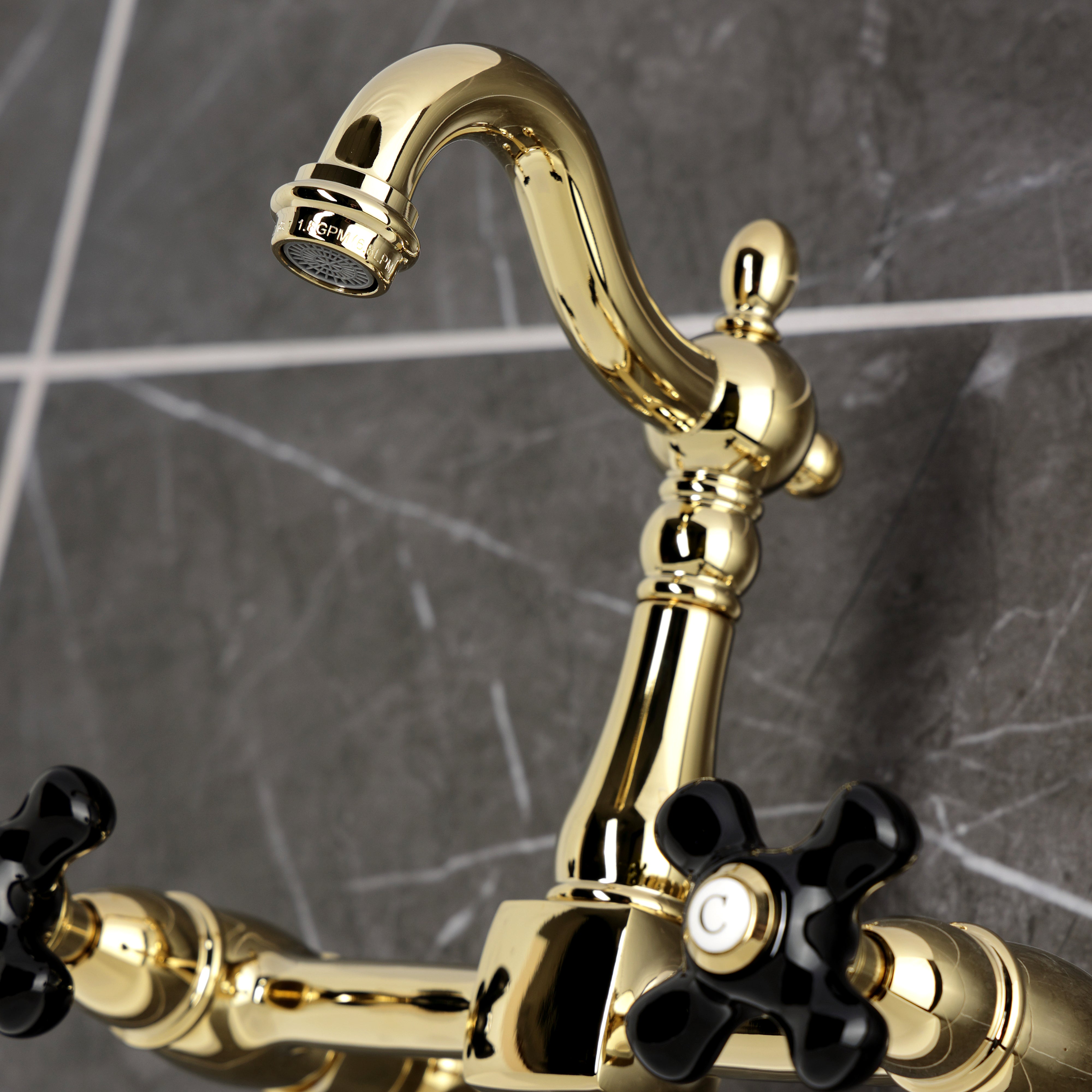 Kingston KS2443PKX Duchess Two-Handle Wall Mount Bridge Kitchen Faucet, Antique Brass in close-up view