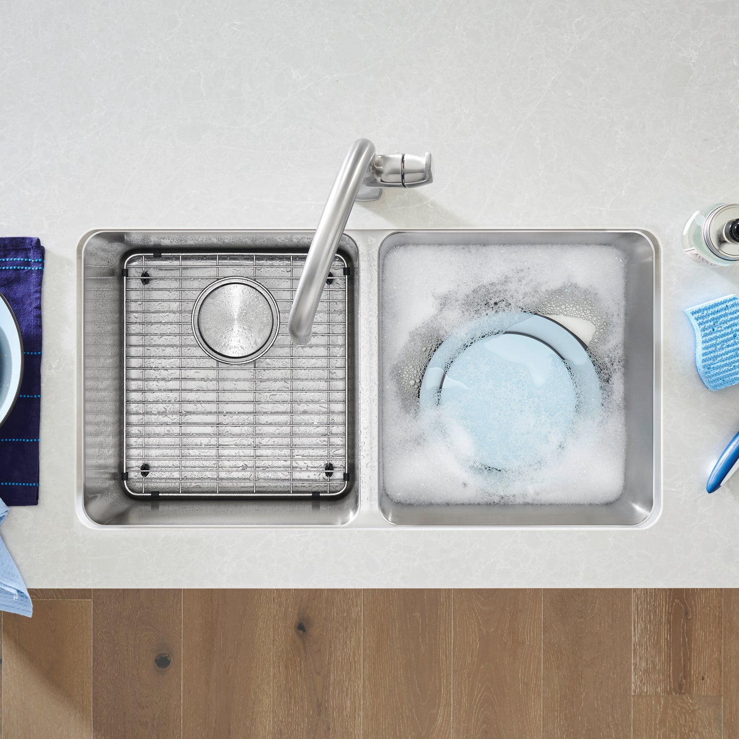 BLANCO Formera 33" 50/50 Double Bowl Undermount Stainless Steel Kitchen Sink with cleaning dishes and drying rack.