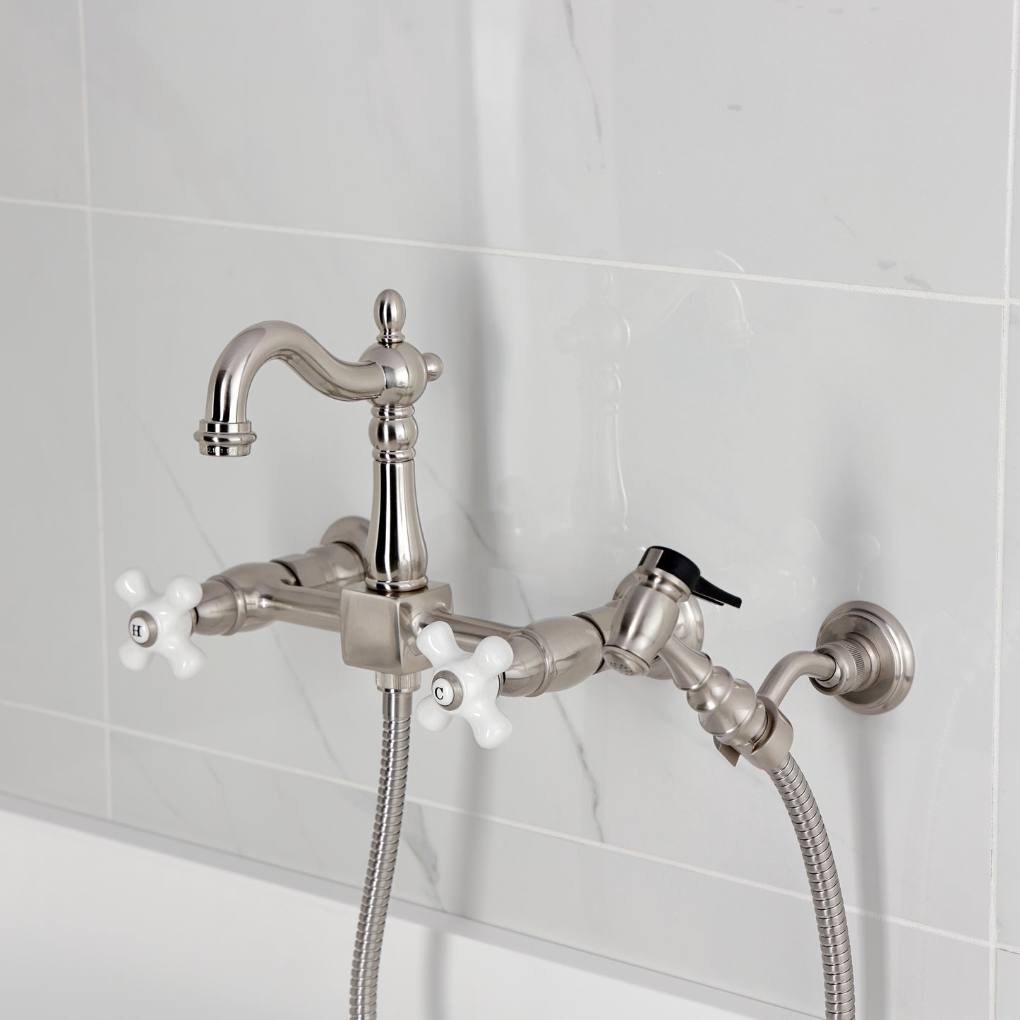Kingston KS2443PXBS Heritage Two-Handle Wall Mount Bridge Kitchen Faucet with Brass Sprayer, Antique Brass