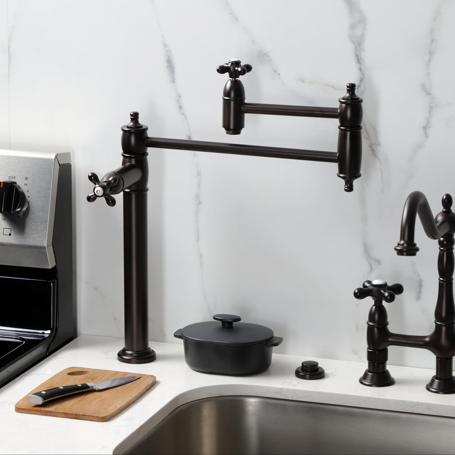 Kingston Brass KS3703AX Restoration Deck Mount Pot Filler Faucet, Antique Brass kitchen setup with pot filler and cooking tools.