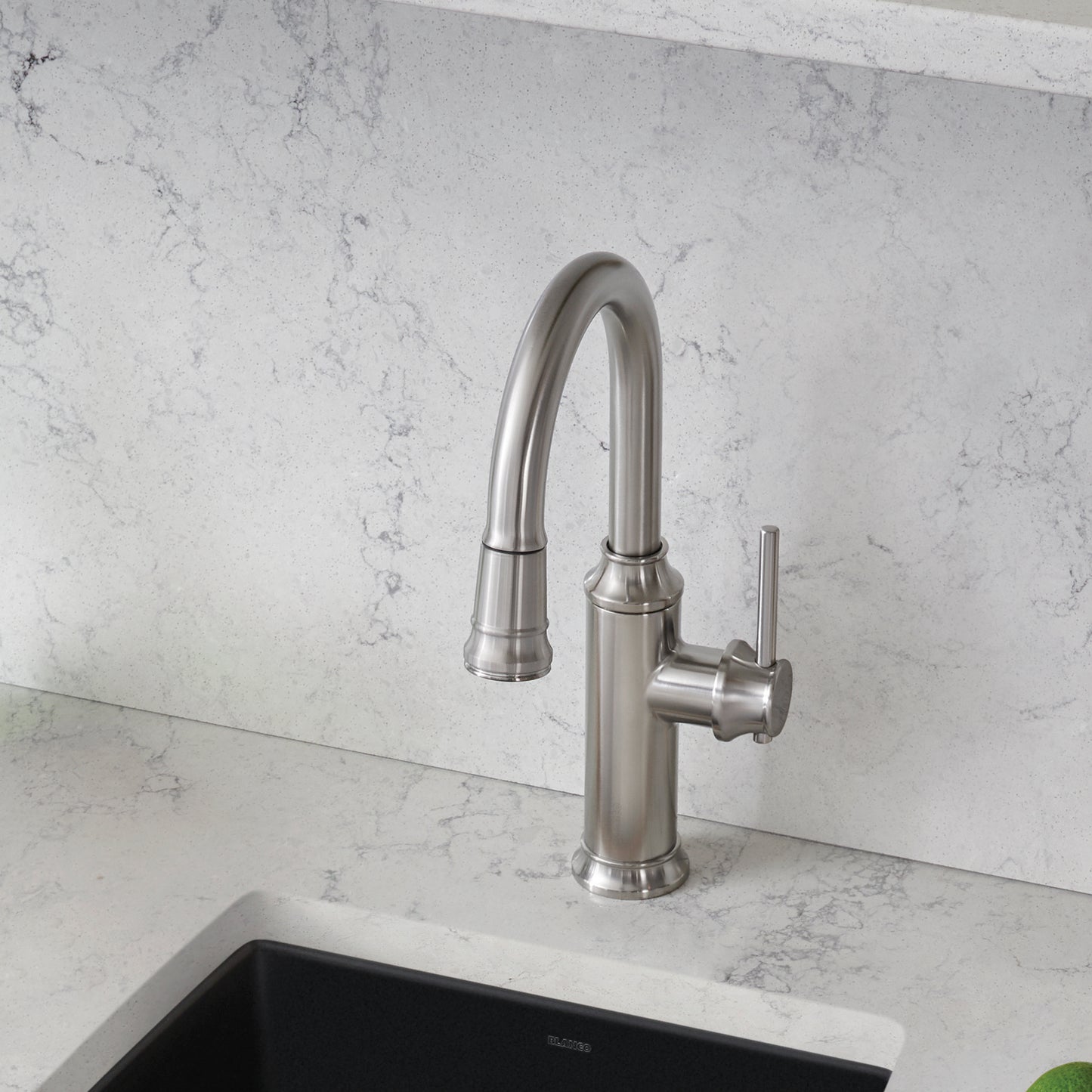 BLANCO Empressa Pull-Down Bar Faucet in vintage wine press design, polished finish against a marble countertop.