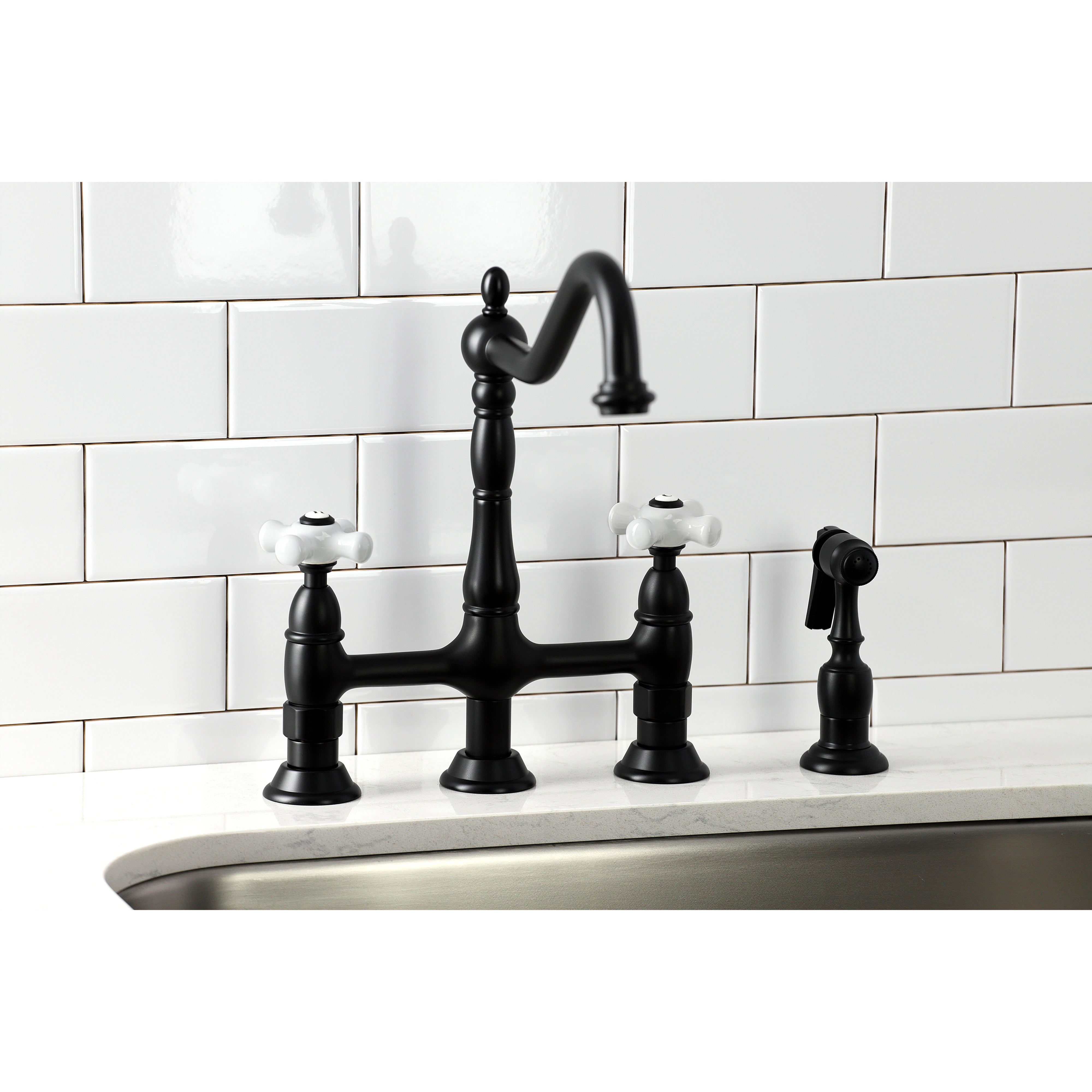 Kingston Brass Heritage Bridge Kitchen Faucet with Brass Sprayer and Cross Handles in Matte Black finish