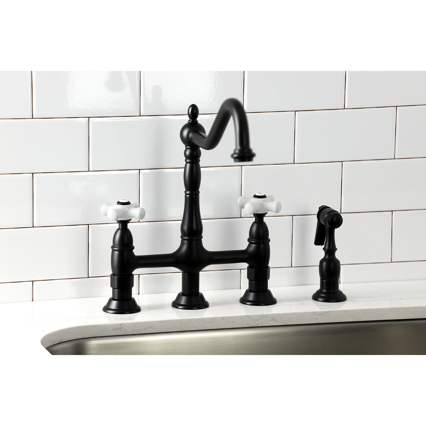 Kingston Brass Heritage Bridge Kitchen Faucet with Brass Sprayer and Cross Handles in Matte Black finish