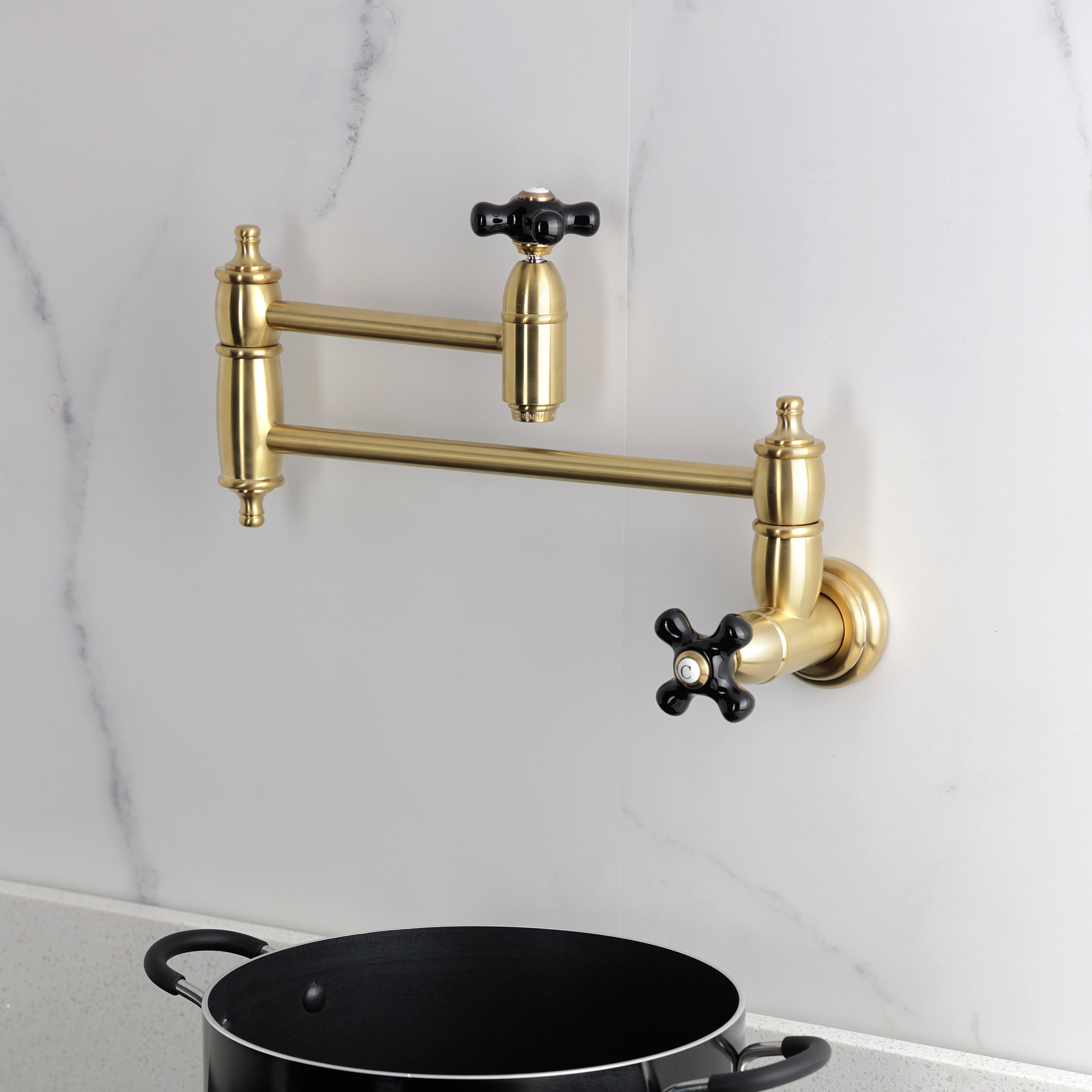 Kingston Brass KS3103PKX Duchess Wall Mount Pot Filler Faucet, Antique Brass with black porcelain handles