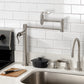 Kingston Brass KS8708DFL NuWave Deck Mount Pot Filler Faucet, Brushed Nickel installed in modern kitchen.