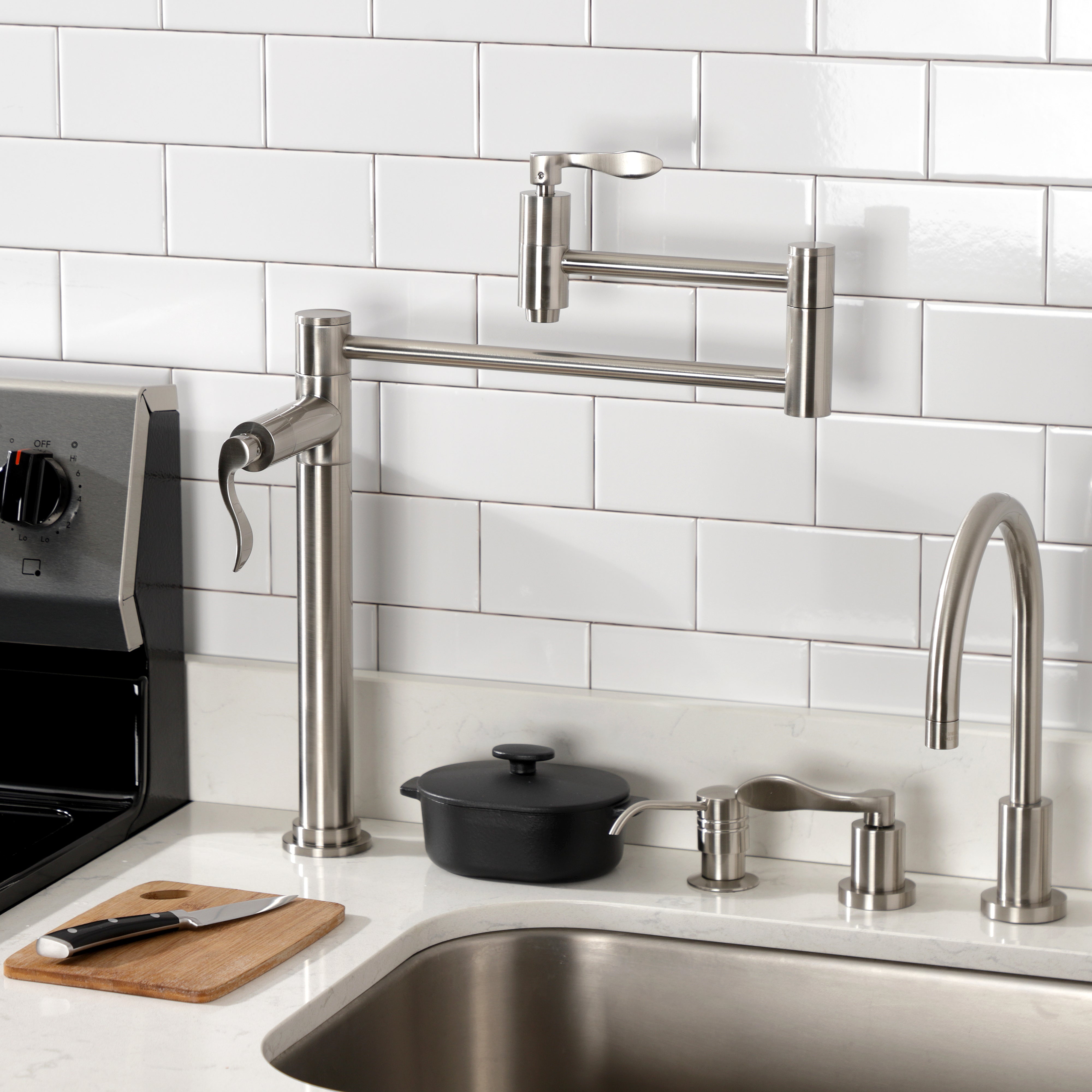 Kingston Brass KS8708DFL NuWave Deck Mount Pot Filler Faucet, Brushed Nickel installed in modern kitchen.