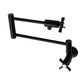 Kingston Brass KS4107ZX Millennium Wall Mount Pot Filler Faucet, Brushed Brass in matte black finish