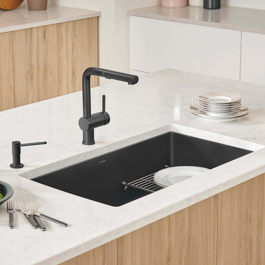 BLANCO Precis SILGRANIT 32" Super Single Undermount Kitchen Sink in a modern kitchen with sleek black faucet.