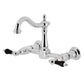 Kingston KS1263PKL Duchess Two-Handle Wall Mount Bridge Kitchen Faucet, Antique Brass with black porcelain handles