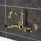 Kingston KS1263PKL Duchess Two-Handle Wall Mount Bridge Kitchen Faucet, Antique Brass with black porcelain handles