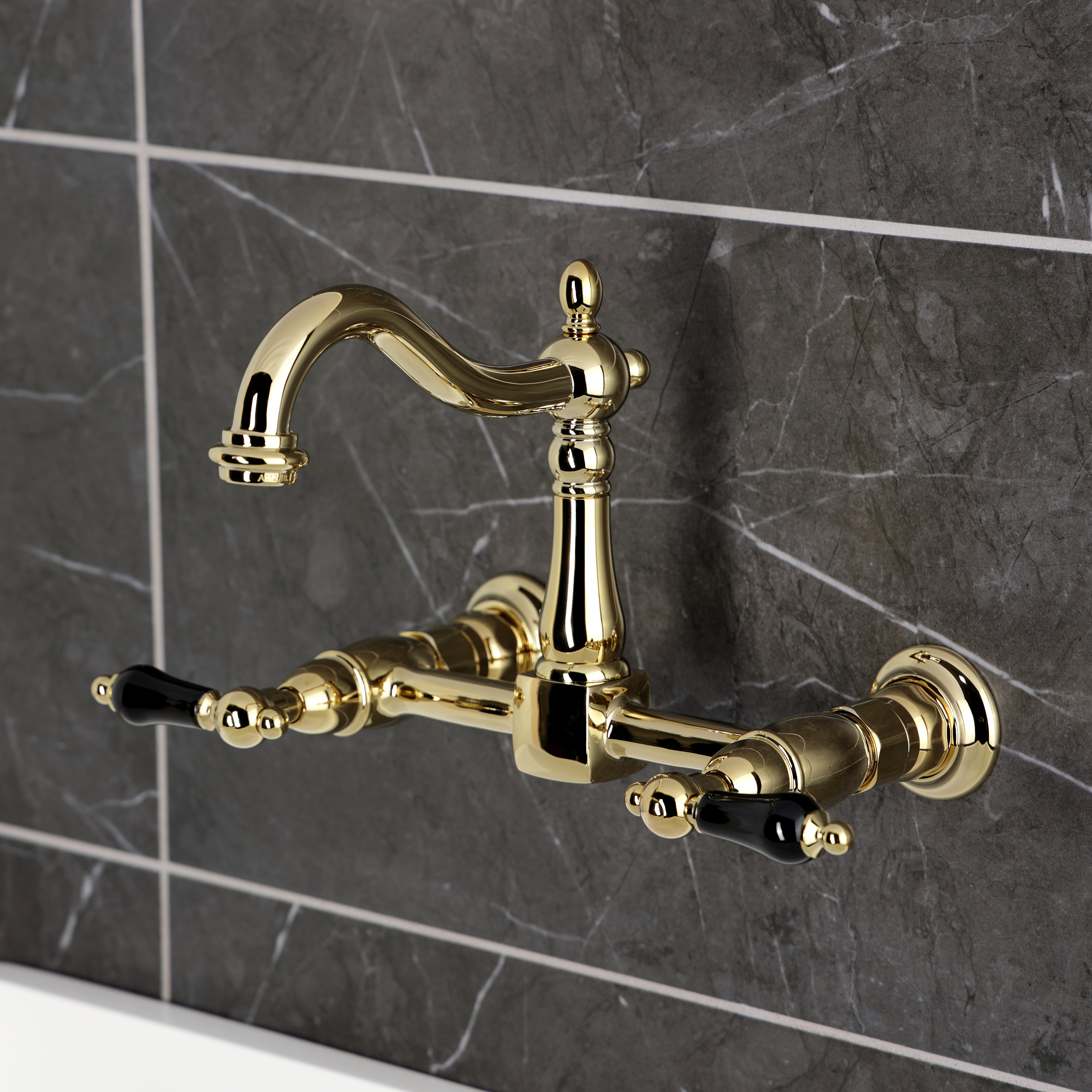 Kingston KS1263PKL Duchess Two-Handle Wall Mount Bridge Kitchen Faucet, Antique Brass with black porcelain handles
