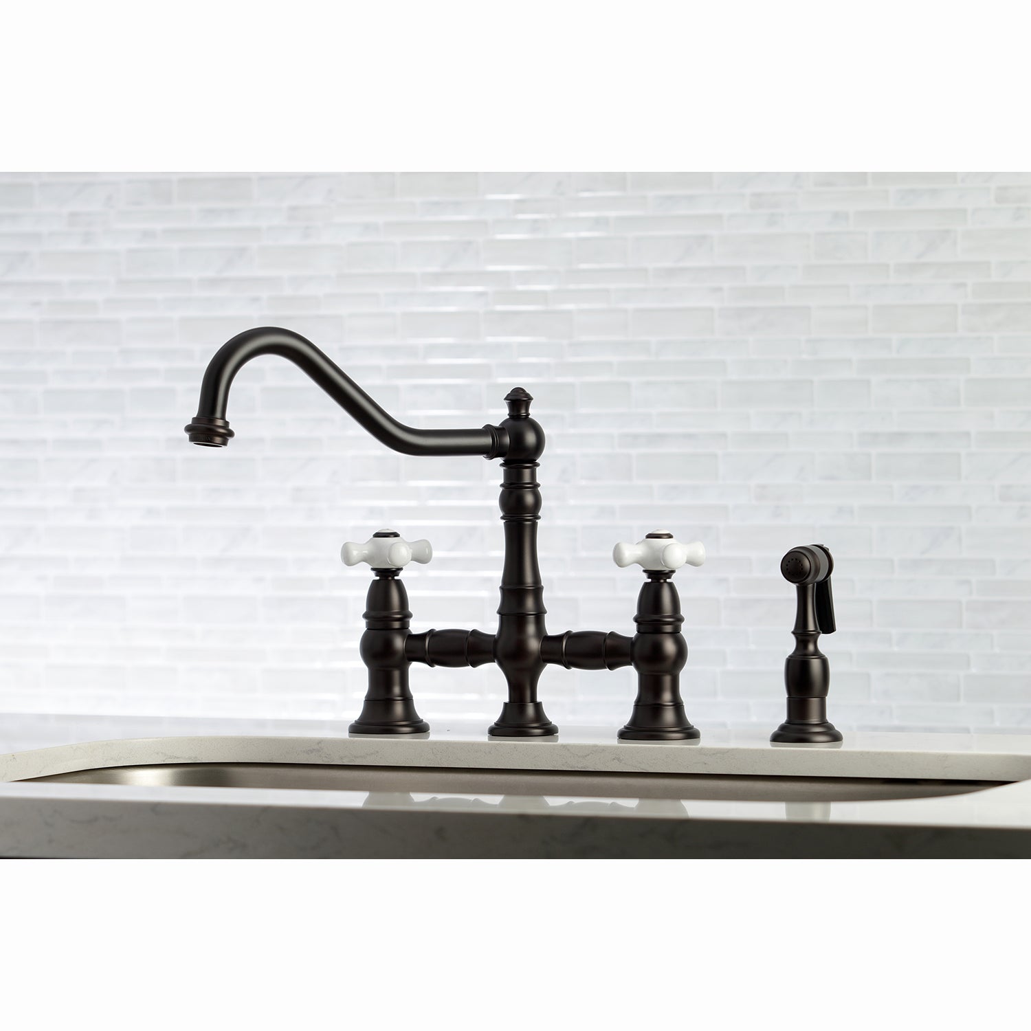 Kingston KS3277PXBS Restoration Bridge Kitchen Faucet with Brass Sprayer, Brushed Brass in a classic kitchen setting