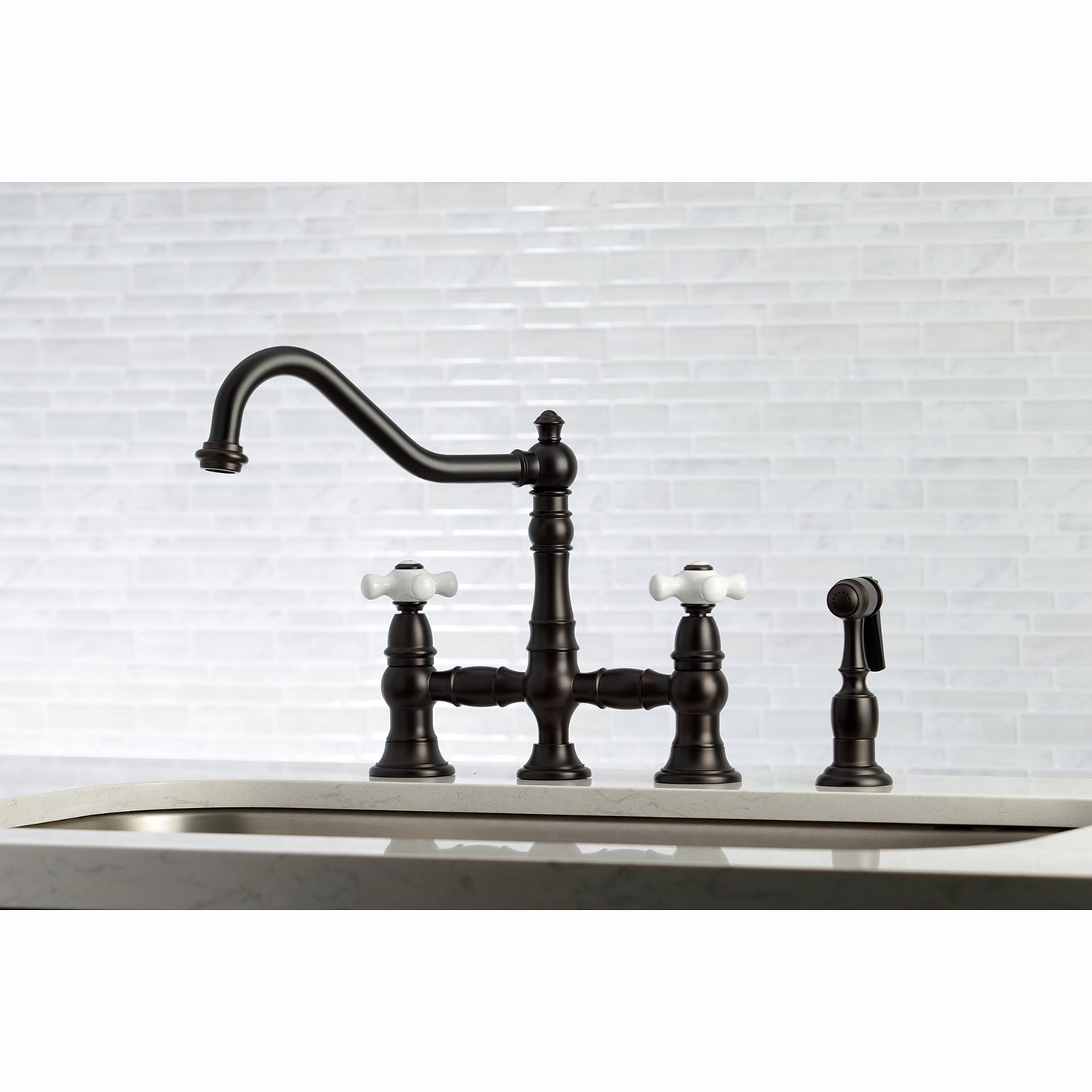 Kingston KS3277PXBS Restoration Bridge Kitchen Faucet with Brass Sprayer, Brushed Brass in a classic kitchen setting